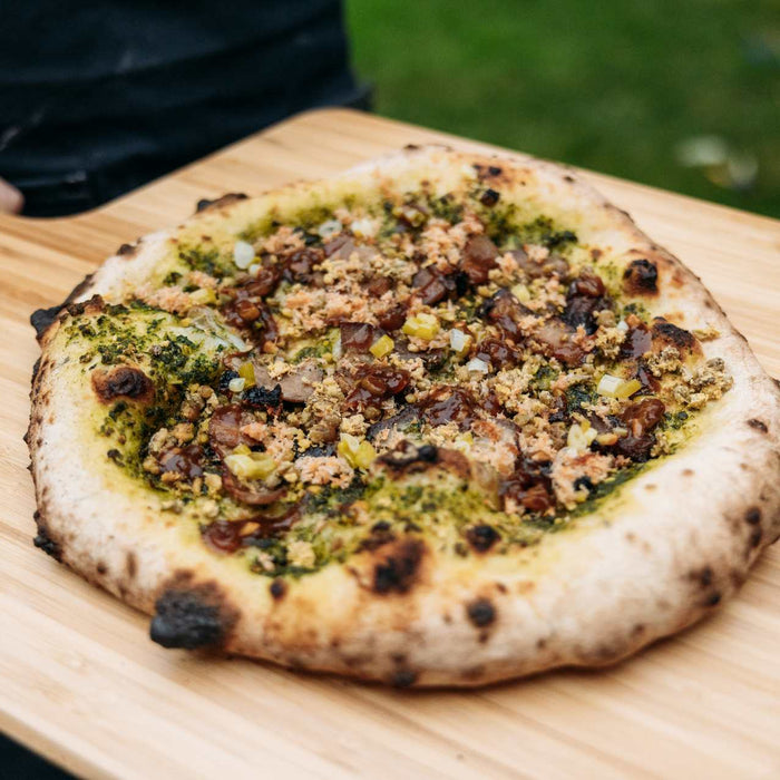 Pizza vietnamita con porchetta di maiale, fagioli Mung e gamberetti